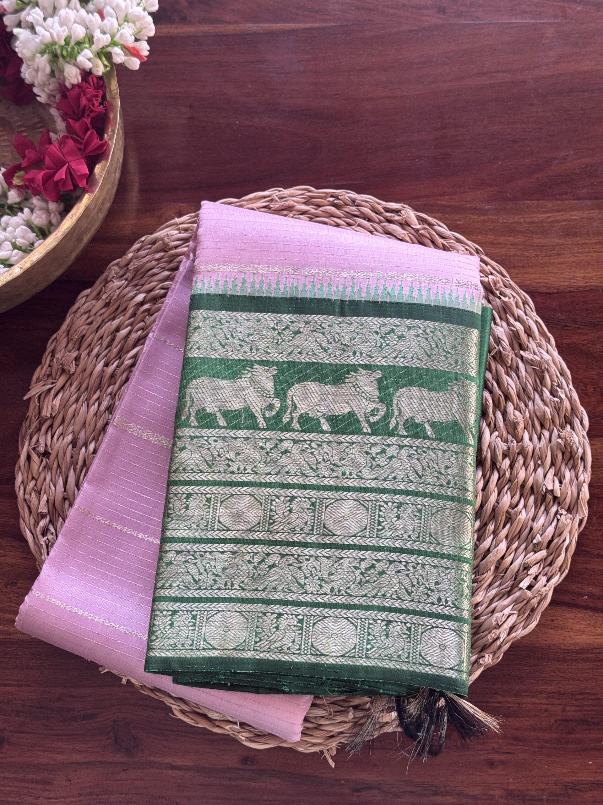 Sinthuja soft pink Kanjivaram silk saree with silver zari and green pallu