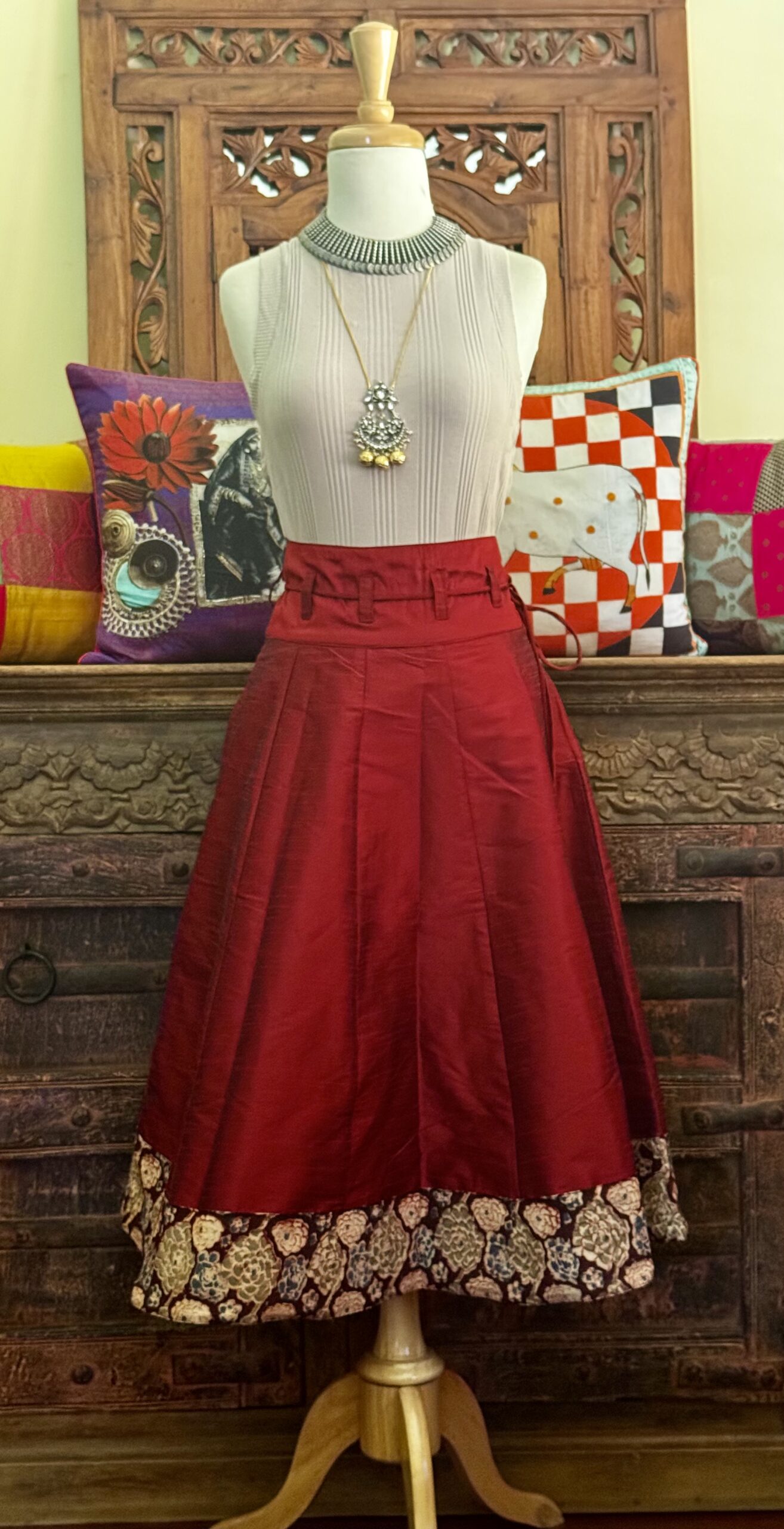Maroon raw silk skirt with handcrafted Kalamkari border and cloth belt by Tari by Gayatri