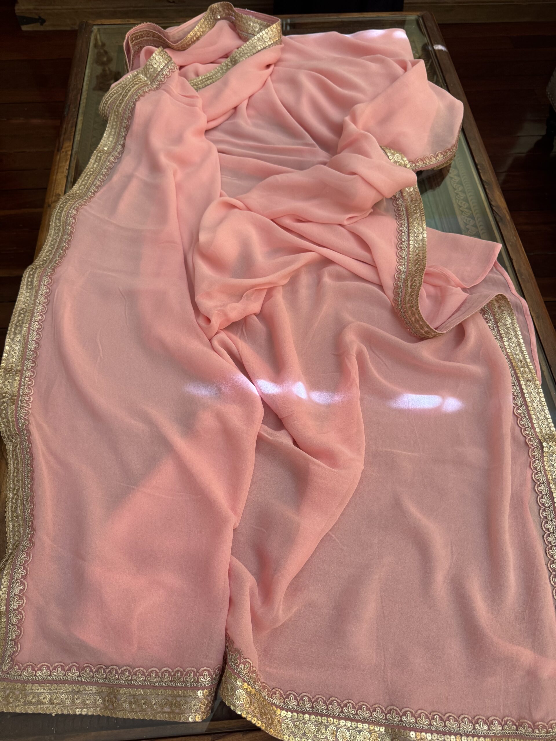 Soft pink shimmer georgette saree with gold lace border – Samaira by Tari by Gayatri