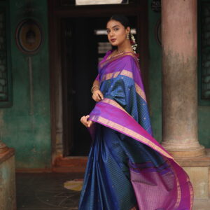Inaya MS blue silk saree with body checks and purple Retta Pattu zari border.