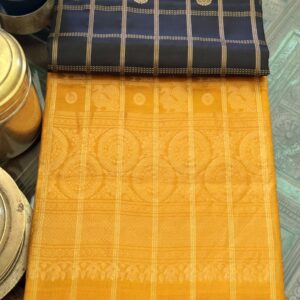 Charcoal and mustard Indika silk saree with traditional Kattam checks and gold zari temple border from Tari by Gayatri.