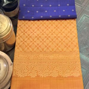 Royal blue and mango yellow silk saree with silver buttas.