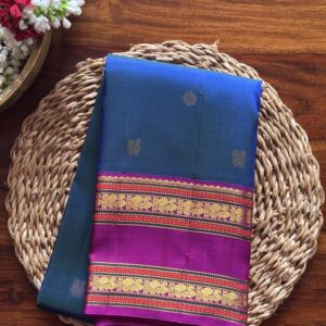 Indraneelam MS blue silk saree with purple Retta Pattu 1g zari border.
