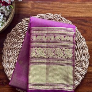 Kamalam silk saree with 1g gold zari border and traditional motifs.