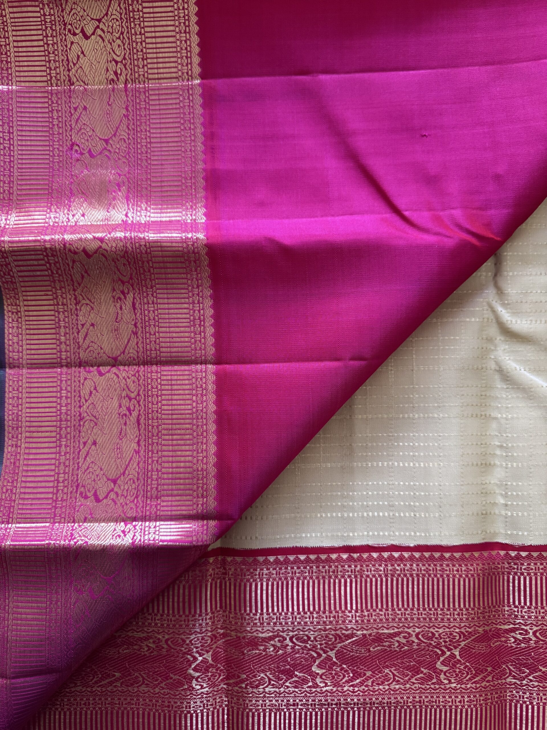 Sidhika silk saree featuring 2g gold zari and a hand-woven pallu with green selvedge.