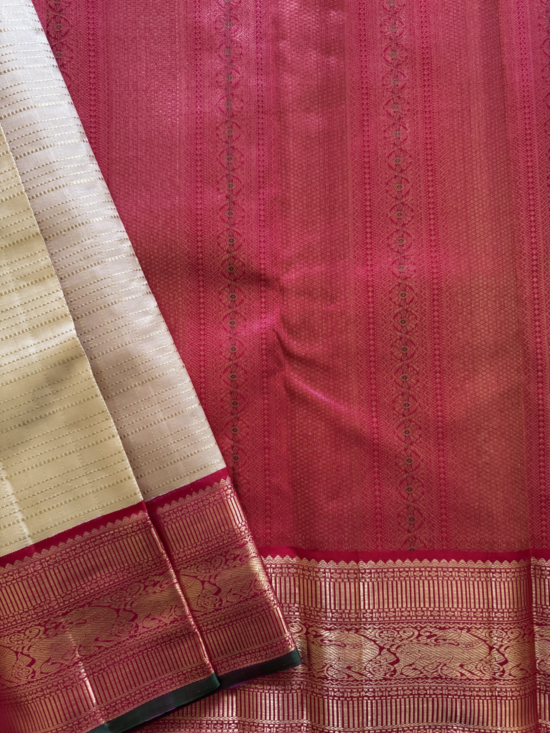 Sidhika silk saree featuring 2g gold zari and a hand-woven pallu with green selvedge.