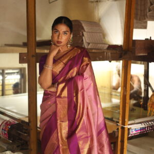 Oviya onion pink Kanjivaram silk saree with woven micro-checks and a deep magenta border.