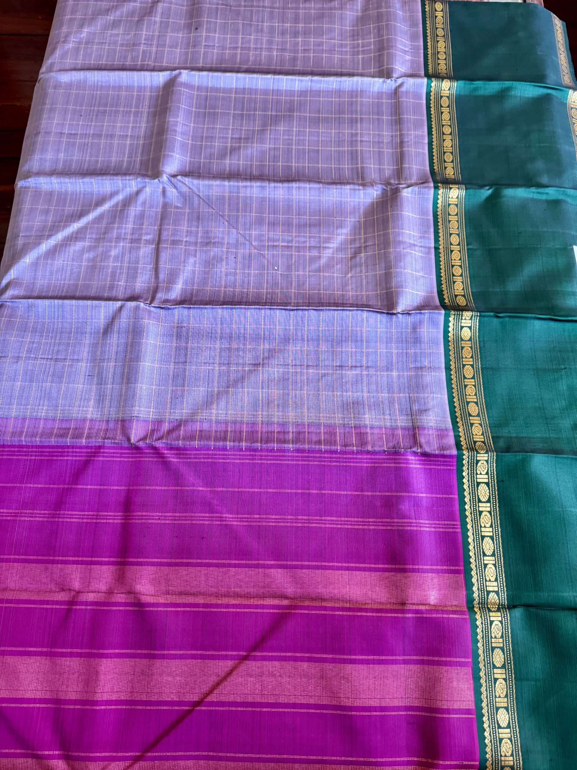 Aavani grey shot Ganga Yamuna Kanjivaram silk saree with contrast magenta and green borders.