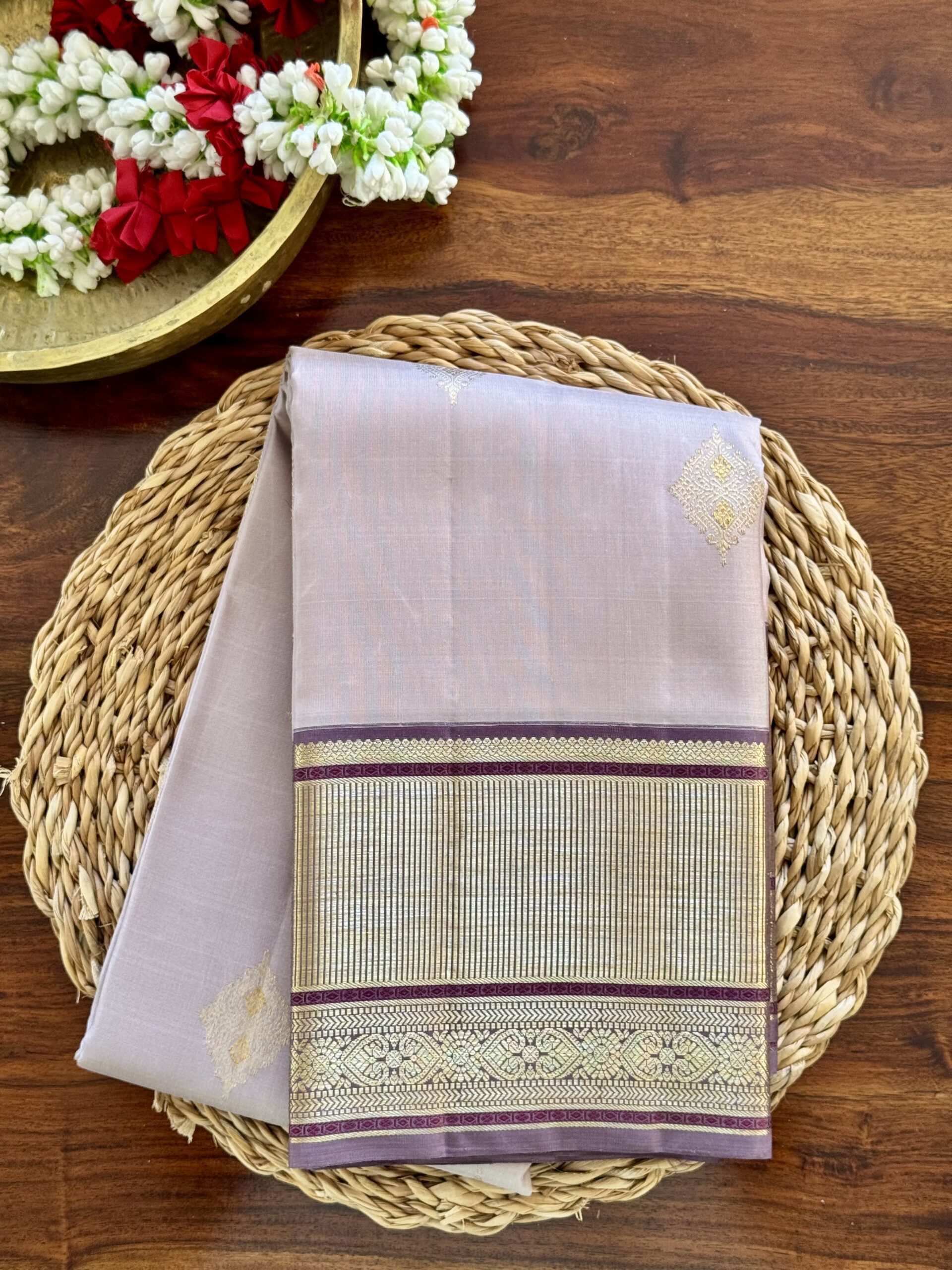 Inaya lavender beige shot Kanjivaram silk saree with woven zari motifs and 2g zari border.