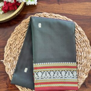 Dhriti dark green hand-woven silk saree with off-white, maroon, and yellow threadwork borders.