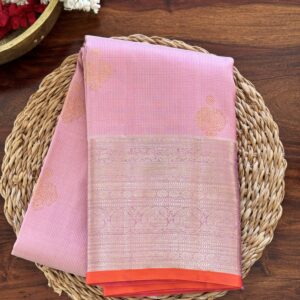 Amara pink and onion shot Kanjivaram silk saree with zari checks and mango and annam motif borders.