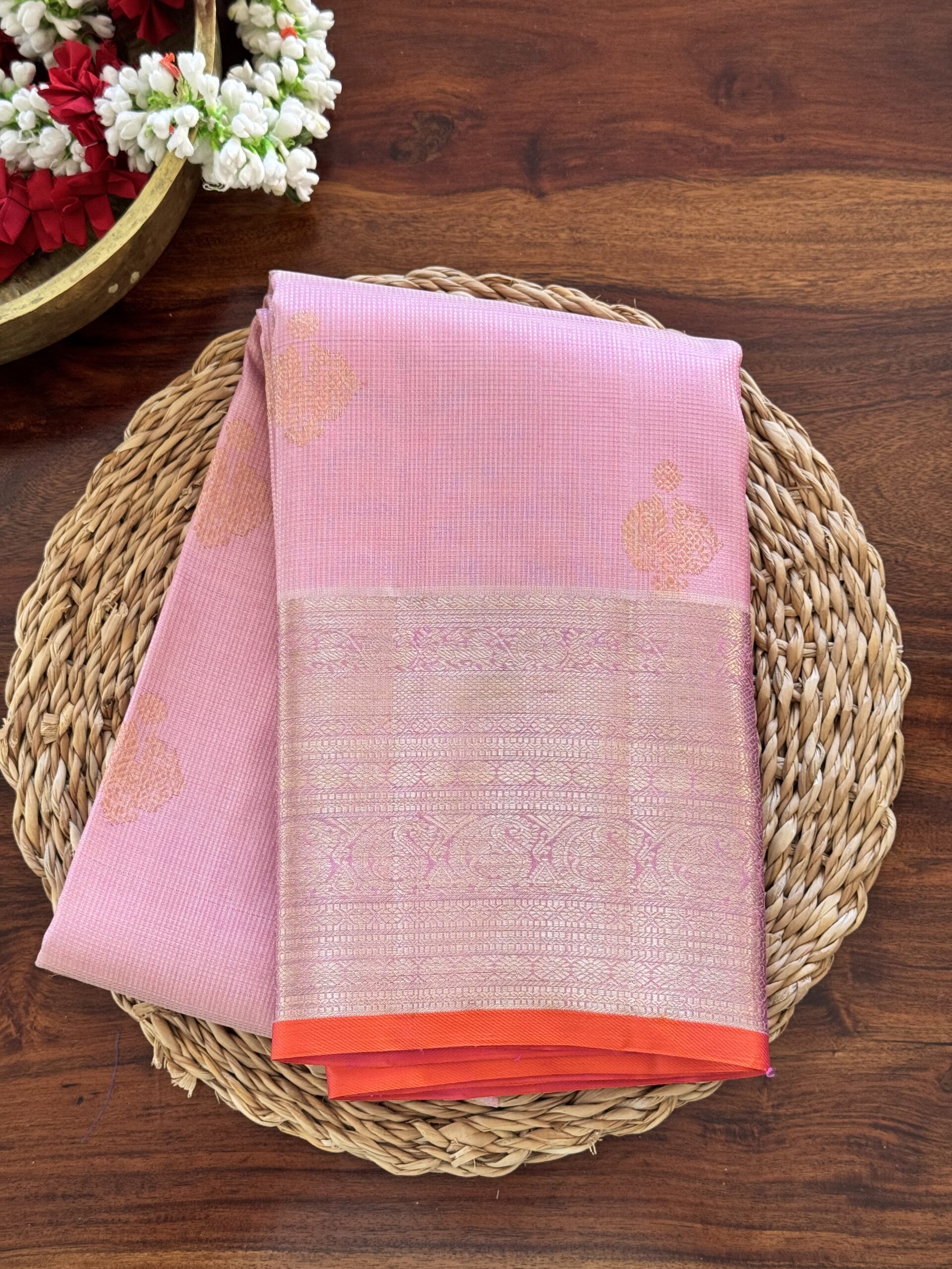 Amara pink and onion shot Kanjivaram silk saree with zari checks and mango and annam motif borders.