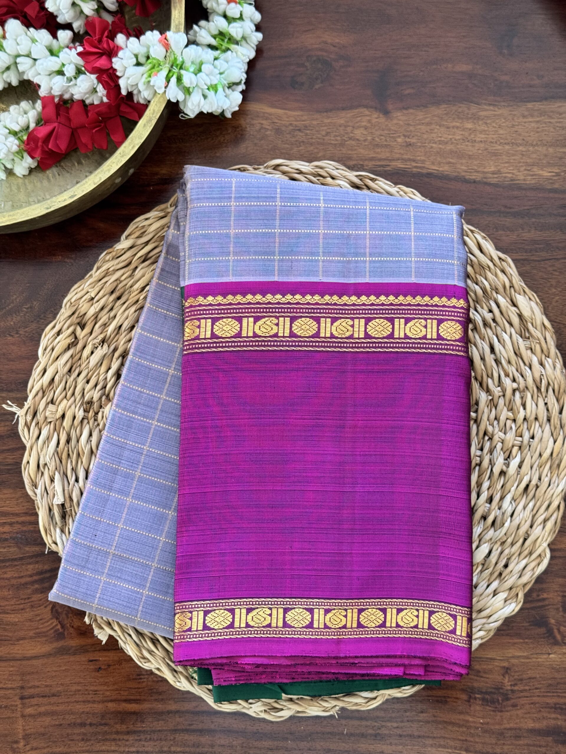 Aavani grey shot Ganga Yamuna Kanjivaram silk saree with contrast magenta and green borders.