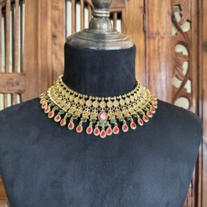 BROE antique gold choker necklace with a coin pattern and pink and green teardrop stones