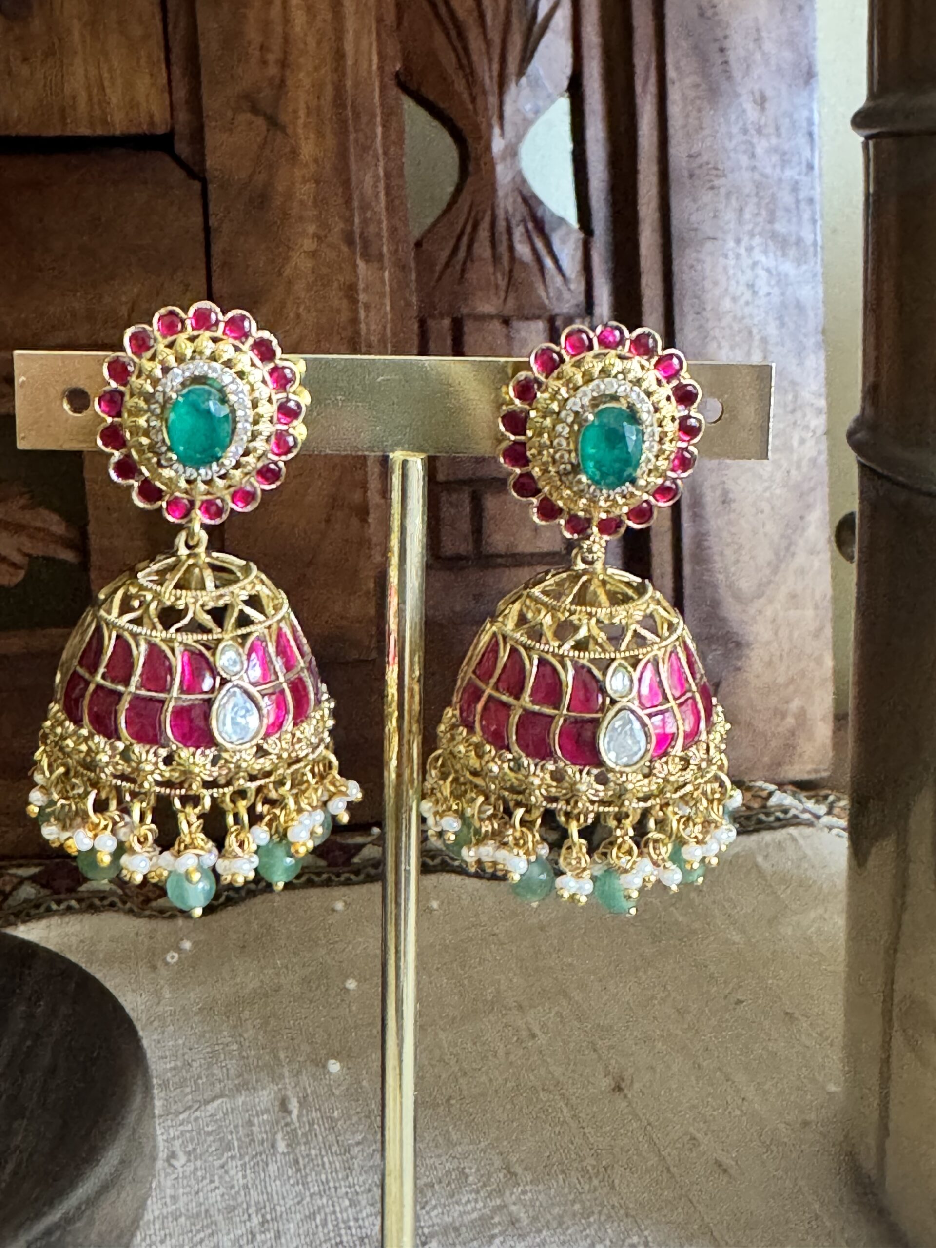 IBIT traditional temple necklace with a large peacock pendant and matching pink jhumki earrings with green bead drops