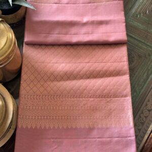 Malati old rose pink borderless soft silk saree with hand-woven zari motifs and an intricate sea green pallu with tassels.