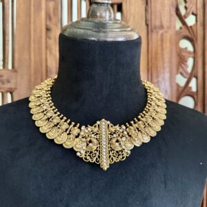 Antique gold kasu mala coin necklace and matching dome jhumki earrings set with white stone details